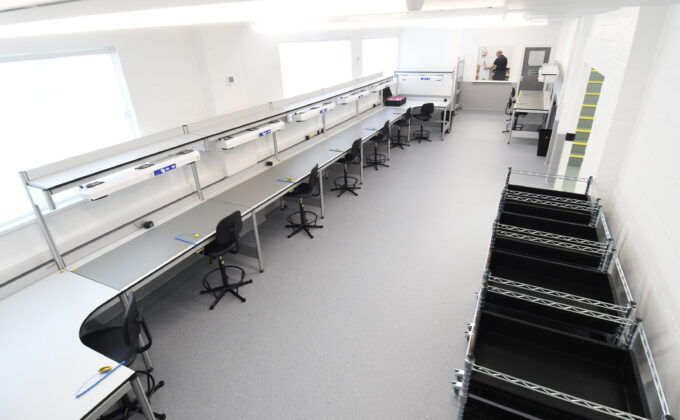 Run of benches including corner benches, upper shelves and ionisers
